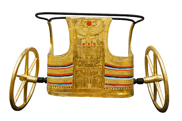 Ancient Egyptian ceremonial chariot on white isolated with clipping path. Modern copy inspired by those found in the tomb of Tutankhamen. Image taken in a popular Egyptian market chariot photos stock pictures, royalty-free photos & images