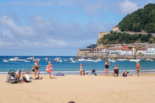 Donostia-San Sebastian, Spain - 15 September 2022: People on La Concha Beach in summer