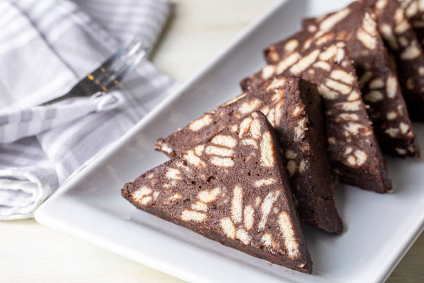 istock Delicious mosaic chocolate and biscuit cake served in a white plate (Turkish name; Mozaik pasta or Mozaik kek) 1625745487