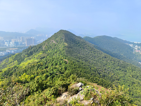 The 335 metres tall Miu Tsai Tun mountain, viewed from High Junk Peak, Clear Water Bay Country Park, Sai Kung, Hong Kong.