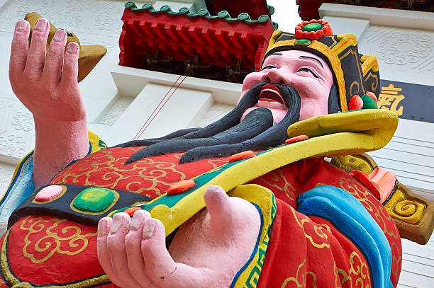 Chinese new year celebration, God of Fortune statue Celebration at a public park with statue in Singpapore. sooth stock pictures, royalty-free photos & images