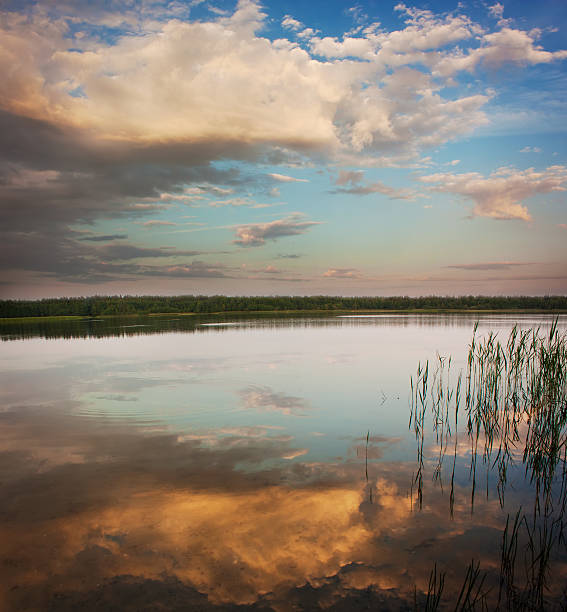 istock Summer Landscape with Calm Lake at Sunset 162578765