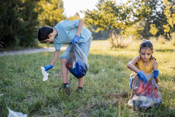 istock Children volunteers cleaning garbage in the park. 1625790155