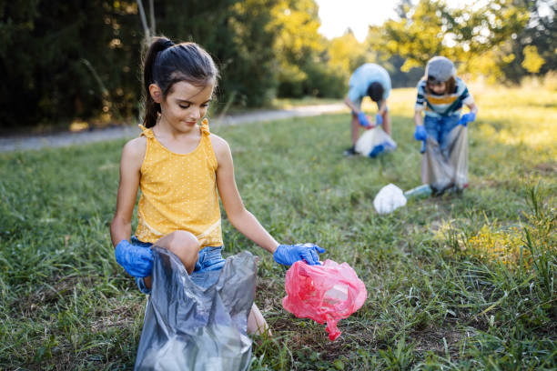 istock Children volunteers cleaning garbage in the park. 1625790159
