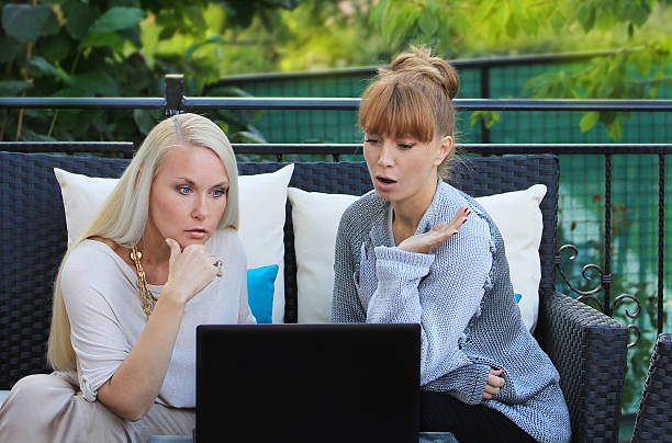 istock Shocked young woman with laptop 162581798