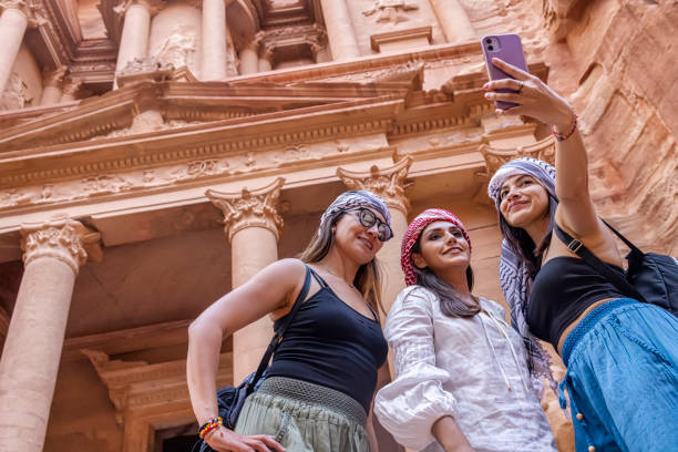 Tourists enjoying the trip in Petra, Jordan.