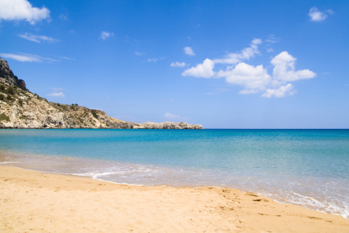 Beautiful empty sandy Tsambika beach. Greece - Rhodes island