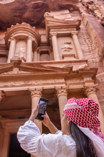istock Tourists enjoying the trip in Petra, Jordan. 1625839754