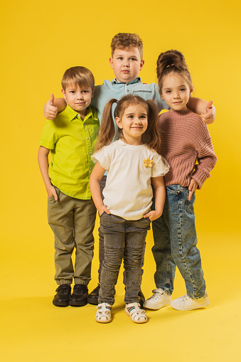 Four children in studio