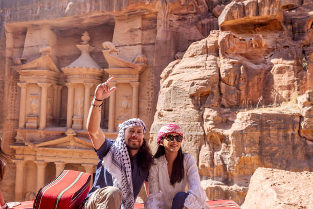 istock Tourists enjoying the trip in Petra, Jordan. 1625846062