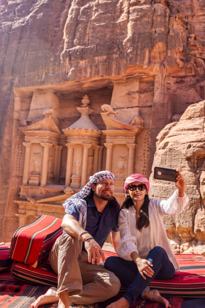 istock Tourists enjoying the trip in Petra, Jordan. 1625846094