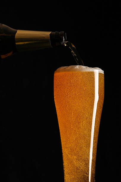 Glass and bottle with beer. stock photo