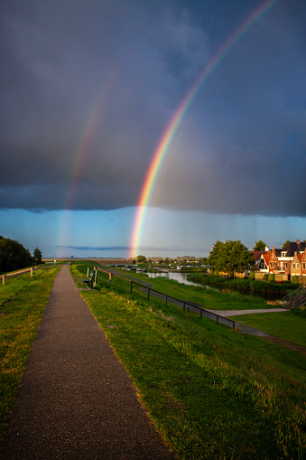 A rainbow on the dyke of Oostmahorn