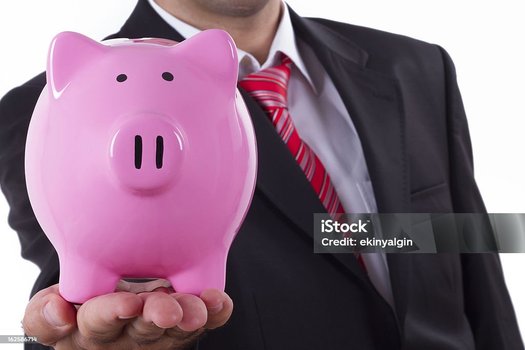 Empresário e Piggy Bank - Foto de stock de Adulto royalty-free