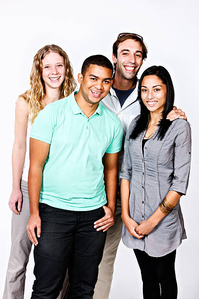 istock Four cute youngsters smile together against white background 162586720