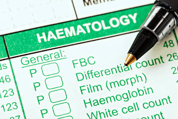 istock Pen rests on form headed Haematology for ordering blood tests 162586729