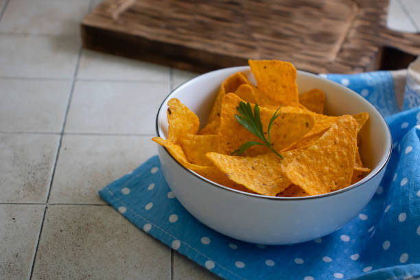 istock Doritos in a plate on an old background 1625883841