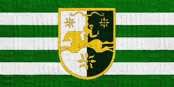 Flag and coat of arms of Republic of Abkhazia on a textured background. Concept collage.