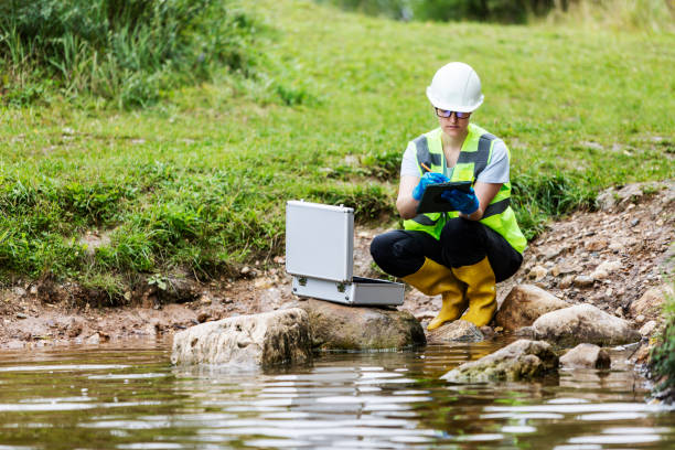istock Mature woman collected river water sample for analysis 1625944150