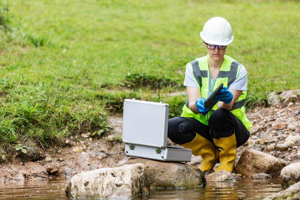 istock Mature woman collected river water sample for analysis 1625959797