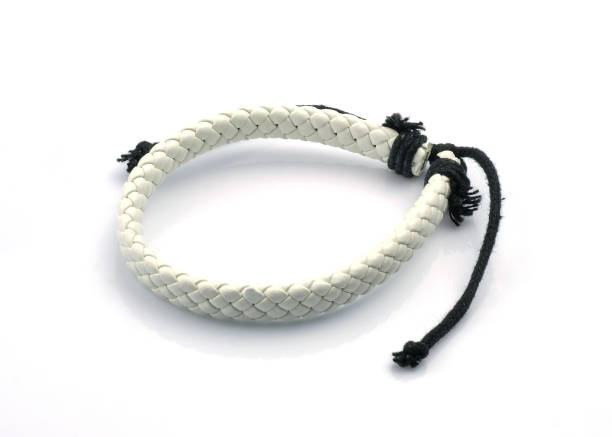 istock White leather bracelet on a white background. 1625999404