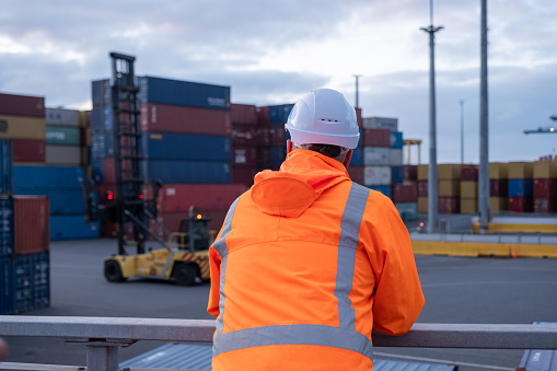 A dock manager observing the works in the container yard