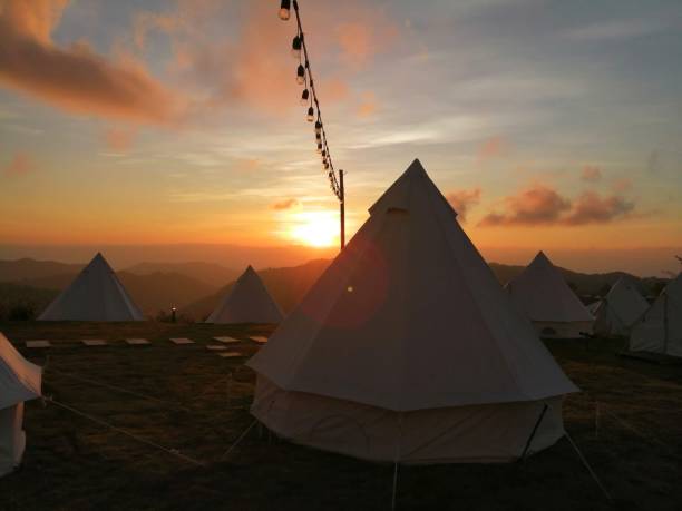 istock pitch a tent in the evening 1626103593