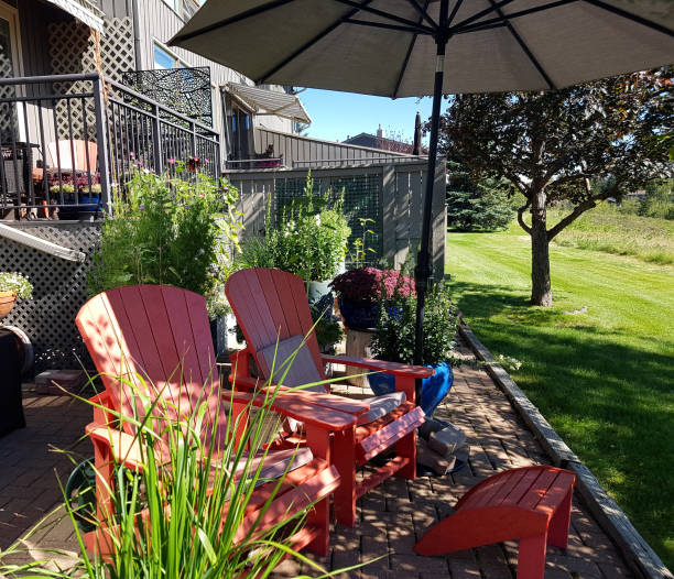 istock Summertime Cozy Patio With Adirondack Chairs 1626117085