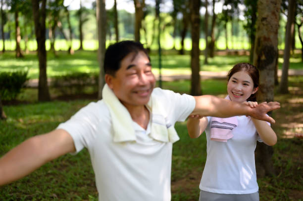 istock Daughter Joins Senior Parent for Heartwarming Exercise. 1626185559