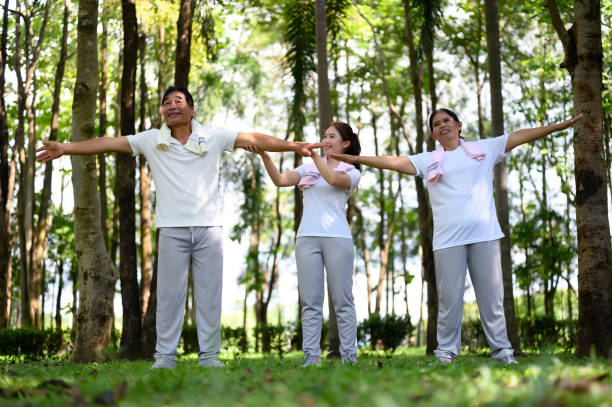 istock Daughter Joins Senior Parent for Heartwarming Exercise. 1626185570