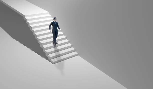 istock businessman walk down stairs on a white background 1626301621