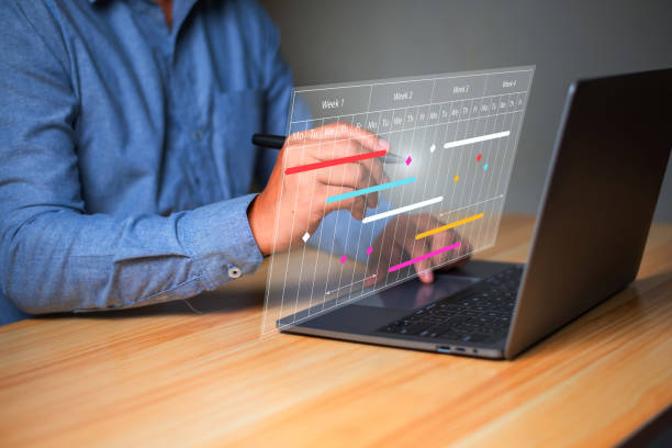 istock Project management concept, businessman working with schedule plan to manage work projects and update tasks. Work progress, project plan, efficient scheduling. 1626331176