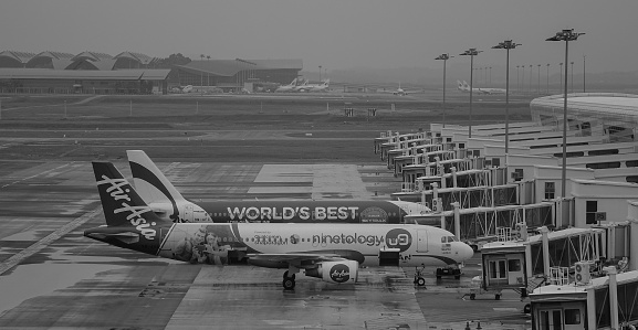 Kuala Lumpur, Malaysia - Dec 16, 2015. AirAsia airplanes docking at KLIA2 Airport in Kuala Lumpur, Malaysia. All flight operations at LCCT were moved to klia2 in 2014.