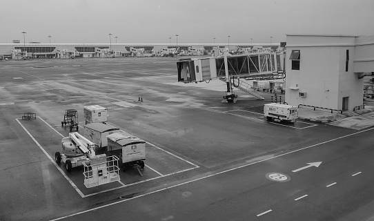 Kuala Lumpur, Malaysia - Dec 16, 2015. Vehicles on runway at KLIA2 Airport in Kuala Lumpur, Malaysia. KLIA2 has a built-up area of 257,845 sqm with 68 departure gates.