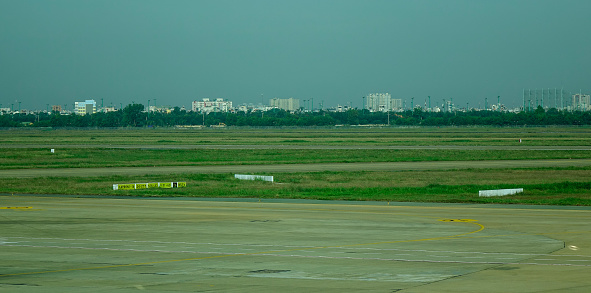 Saigon, Vietnam - Jan 2, 2017. Runway at Tan Son Nhat Airport in Saigon (Ho Chi Minh City), Vietnam. TSN is the busiest airport in Vietnam with 32.5 million passengers in 2016.