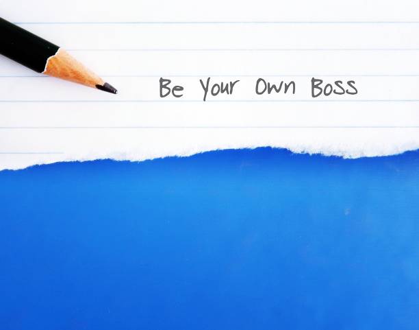 istock A pencil on line note paper with text written BE YOUR OWN BOSS, concept of decision making to quit corporate job and start business 1626451817