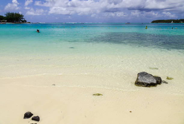 Beautiful beach in Grand Baie, Mauritius Island. Mauritius, an Indian Ocean island nation, is known for its beaches, lagoons and reefs.