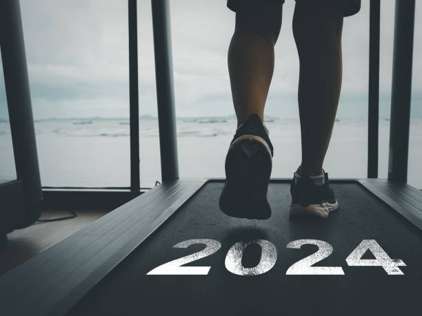 istock A runner running on a treadmill with the text 2024. 1626499671