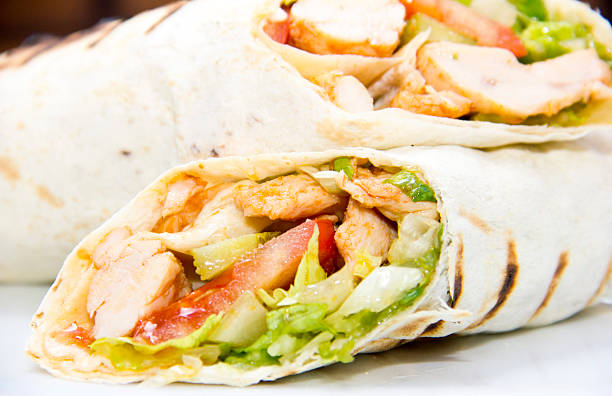 Döner kebap - Chicken Salad Sandwich Wrap Chicken Wrap Sandwich with Salad sandwich club sandwich lunch restaurant stock pictures, royalty-free photos & images