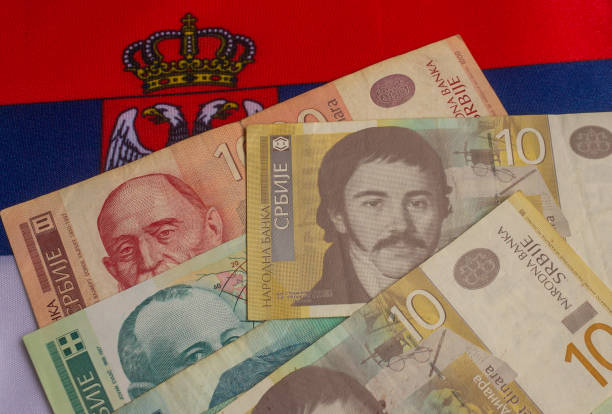 istock Serbian dinar banknotes with the national flag background 1626638968