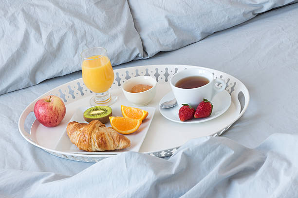 istock Tray with healthy breakfast on a bed 162664727