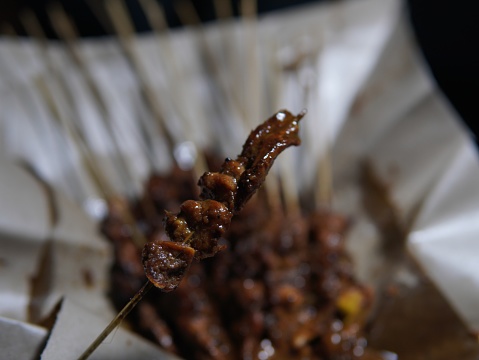 Indonesian food in the form of chicken satay with peanut sauce