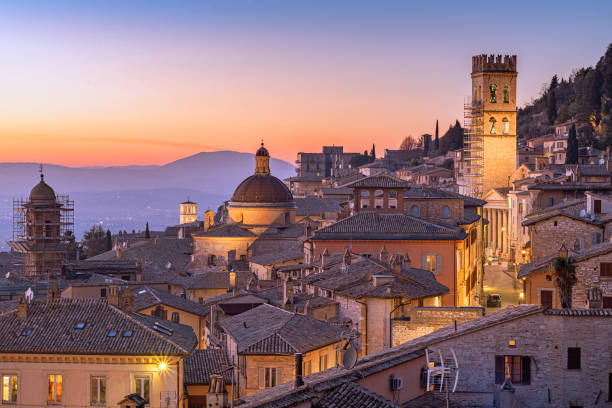 istock Assisi, Italy rooftop hilltop old Town at Dusk 1626675105
