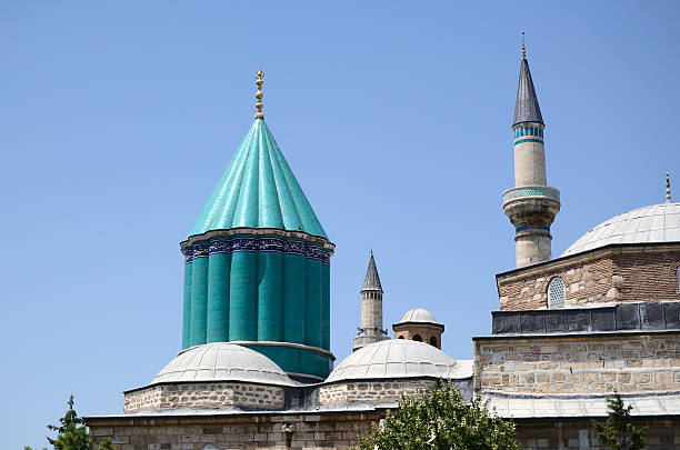 Mevlana Museum in Konya (Turkey) The Mevlâna museum, located in Konya, Turkey, is the mausoleum of Jalal ad-Din Muhammad Rumi, a Sufi mystic also known as Mevlâna or Rumi. It was also the dervish lodge (tekke) of the Mevlevi order, better known as the whirling dervishes. mevlana stock pictures, royalty-free photos & images
