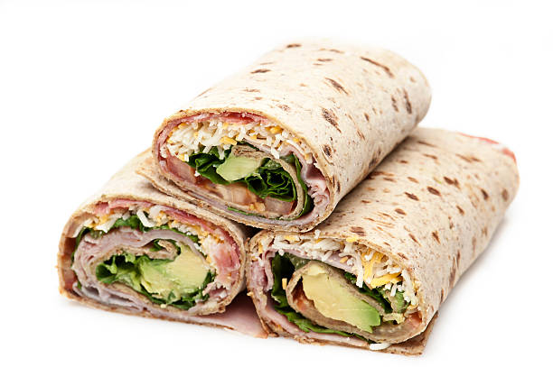 istock Avocado, ham, cheese,lettuce and tomato wrap sandwiches 162668167