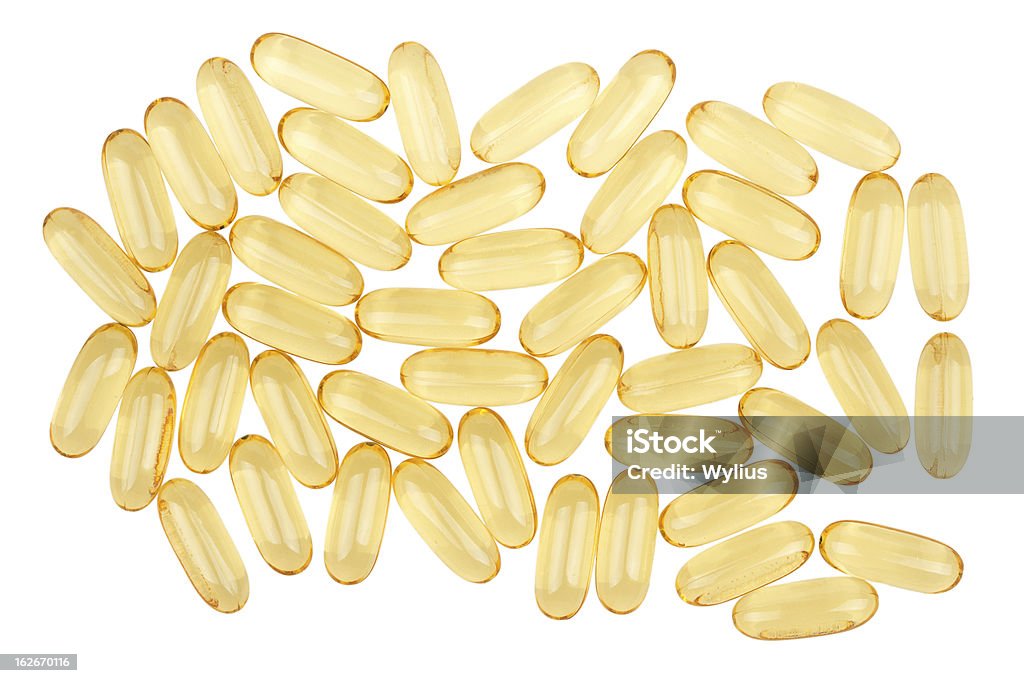 Pila di capsule di olio di pesce - Foto stock royalty-free di Bianco