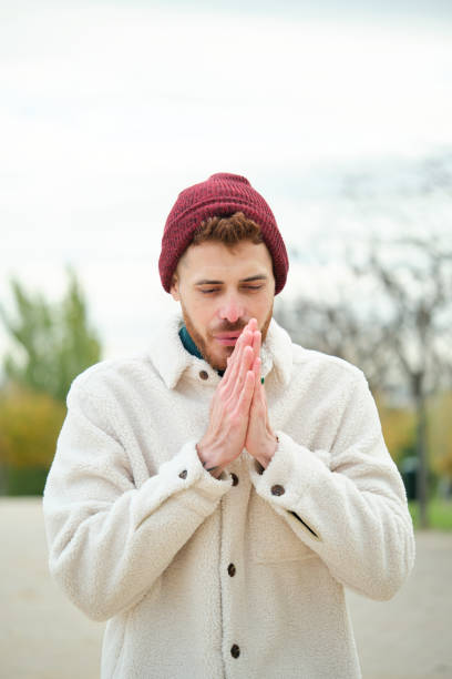 istock Man rubbing his hands to warmth during winter. 1626708565