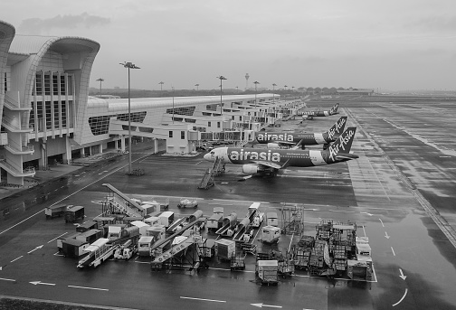 Kuala Lumpur, Malaysia - Dec 16, 2015. AirAsia Terminal in Kuala Lumpur Airport, Malaysia. AirAsia airplanes near new KLIA2 Terminal (Kuala Lumpur International Airport 2).