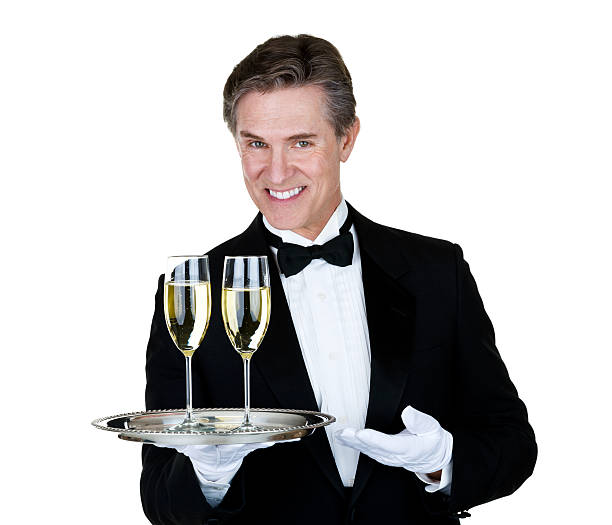 homme servant champagne - upper class butler high society serving tray photos et images de collection