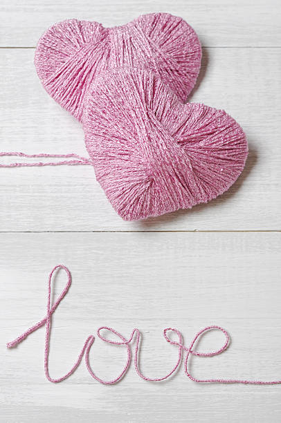 istock Two pink clews in shape of heart 162674629